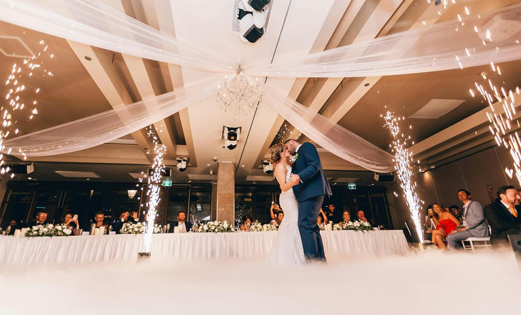 How to Tour a Louisiana Wedding Venue 1 Couple kissing under a canopy while touring a Louisiana wedding venue