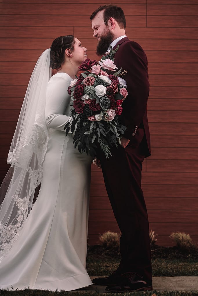 The Faded Lens | Lake Charles Wedding Photography 2 Bride and Groom Embracing looking into eachothers' eyes. Lake Charles Wedding Photographer